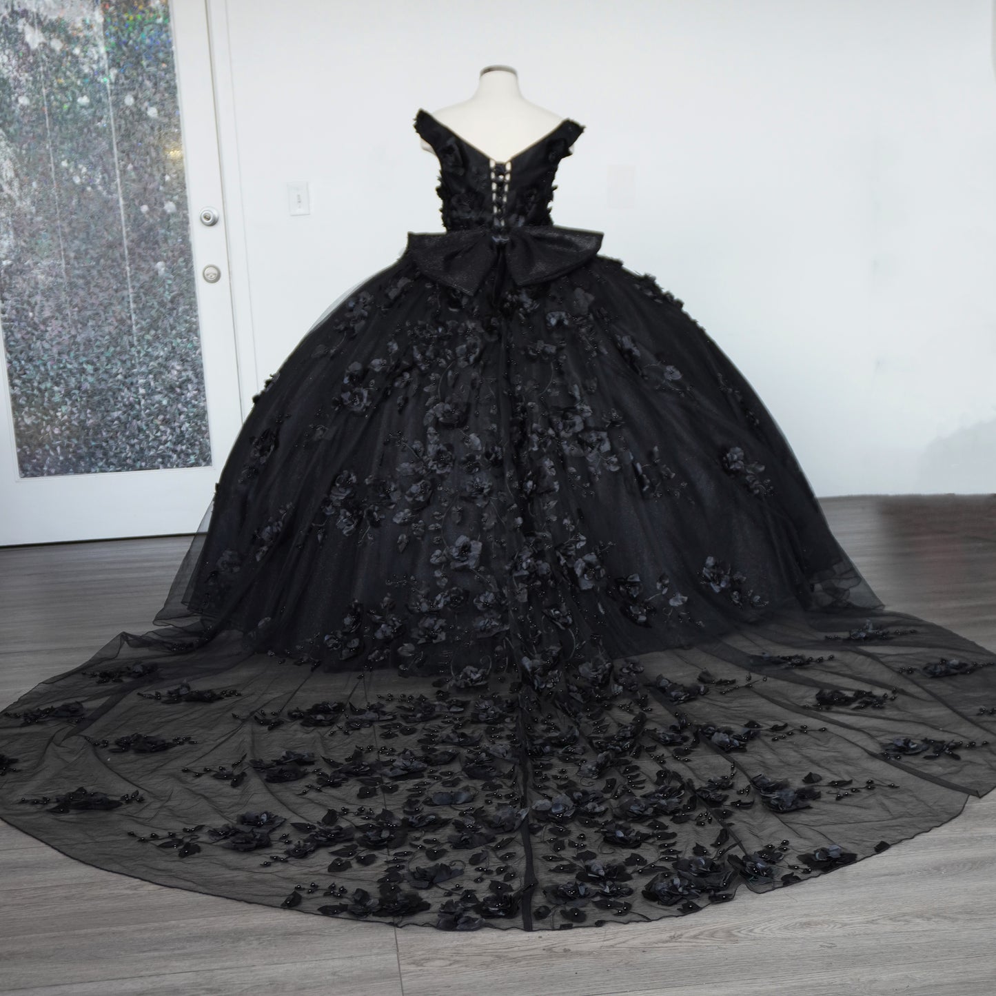 Black shiny quinceanera dress