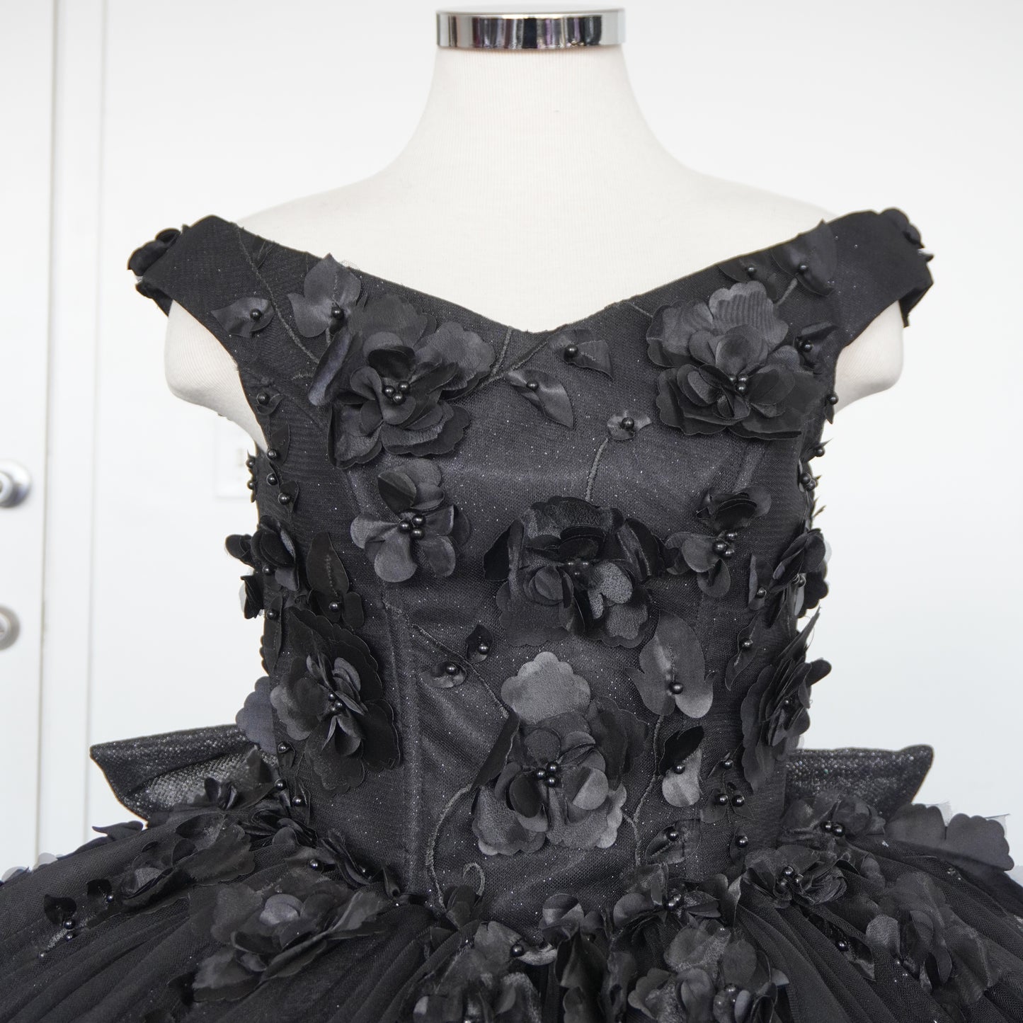 Black shiny quinceanera dress