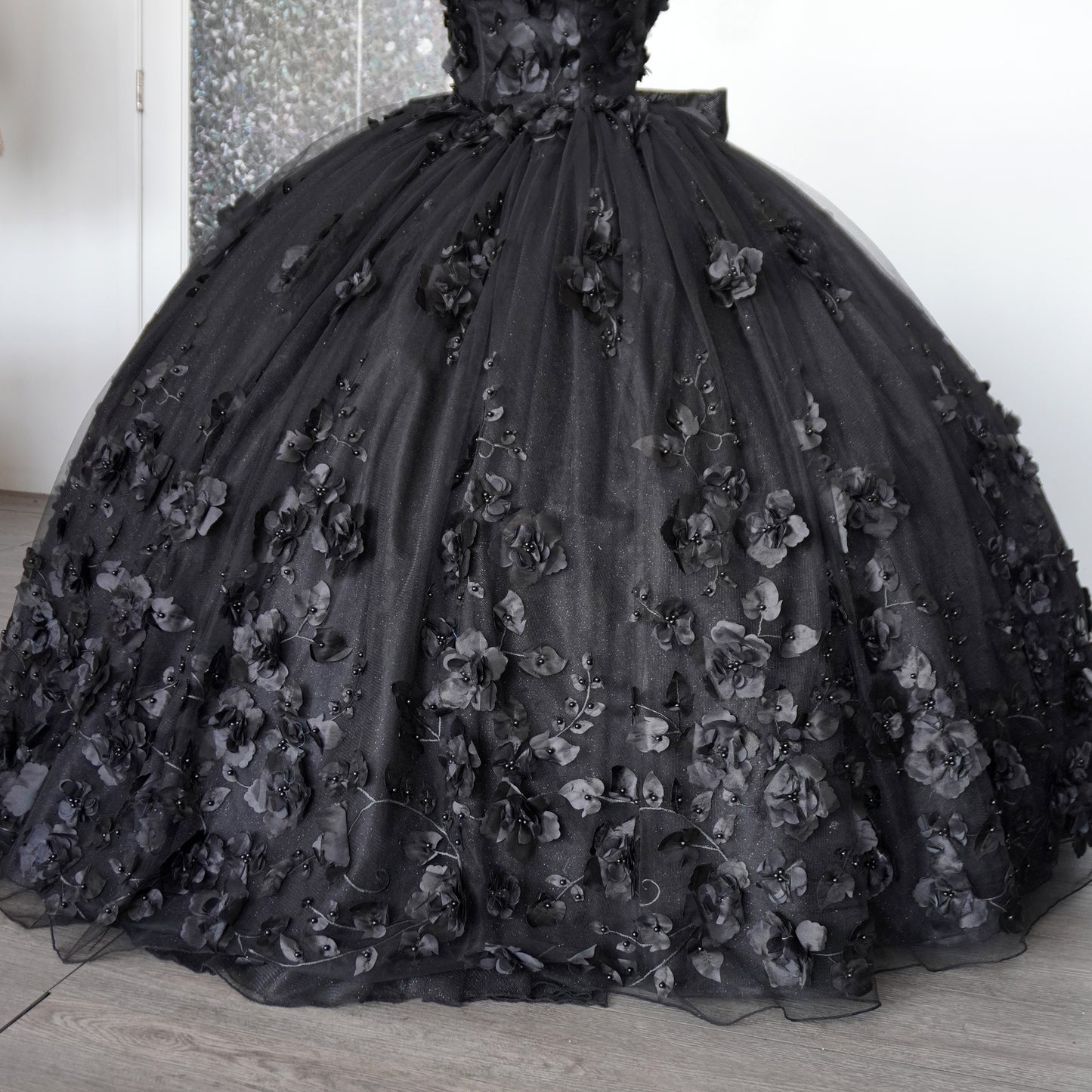 Black shiny quinceanera dress