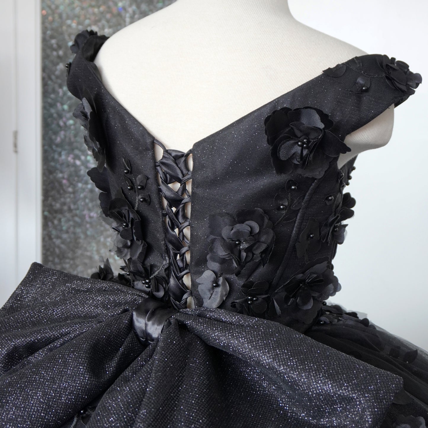 Black shiny quinceanera dress