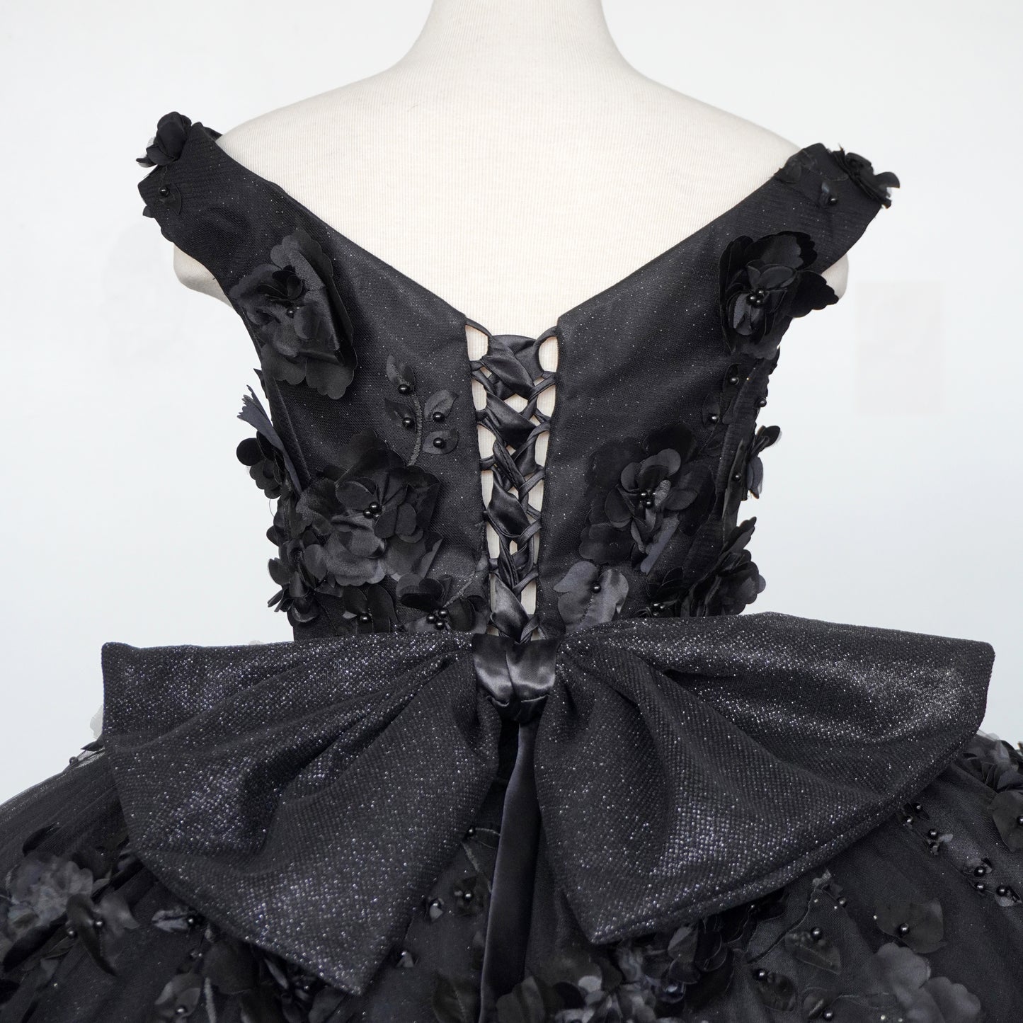 Black shiny quinceanera dress